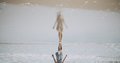 woman walking on beach shore