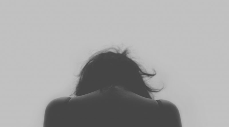 grayscale photo of person's back